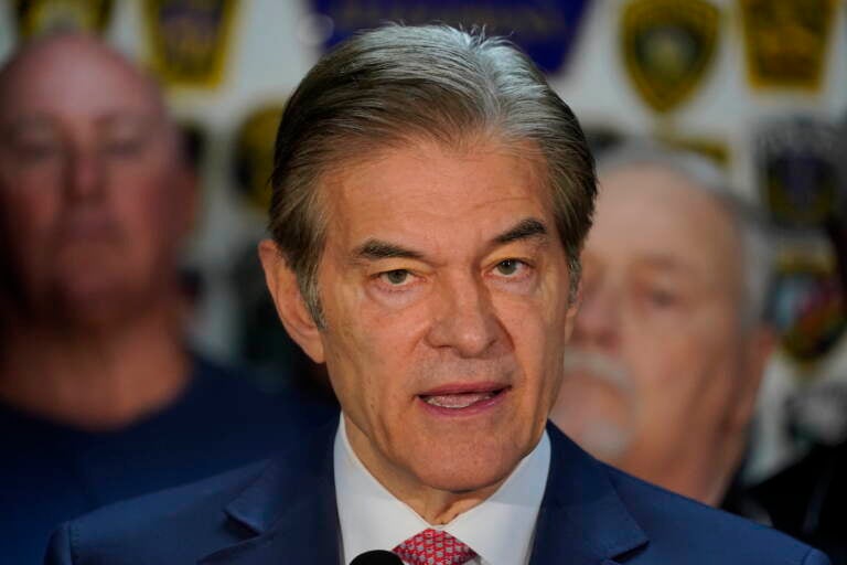 Dr. Mehmet Oz, then the Republican candidate for U.S. Senate in Pennsylvania, visits the Fraternal Order of Police Lodge 91 in West Homestead, Pa., Tuesday, Oct. 18, 2022. (AP Photo/Gene J. Puskar)