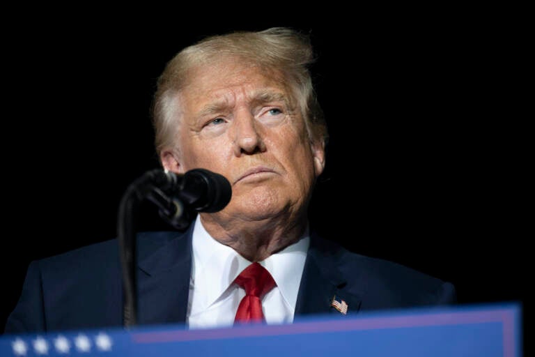 File photo: Former President Donald Trump pauses while speaking at a rally at the Minden Tahoe Airport in Minden, Nev., on Oct. 8, 2022.  (AP Photo/José Luis Villegas, Pool, File)