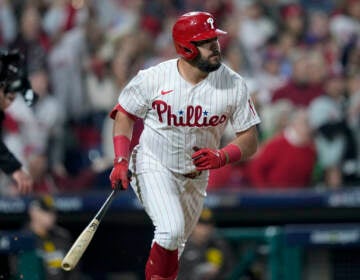 Philadelphia Phillies' Kyle Schwarber watches his home run during the first inning in Game 3 of the baseball NL Championship Series between the San Diego Padres and the Philadelphia Phillies on Friday, Oct. 21, 2022, in Philadelphia.(AP Photo/Matt Slocum)