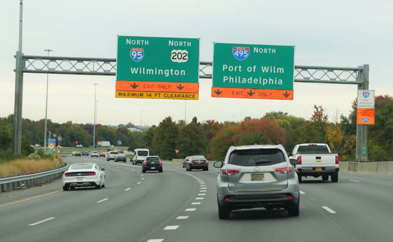 Highway signs on Interstate 95, Route 202 and Interstate 495 splits in Wilmington, Del. (Khairil A Junos/ BigStock)