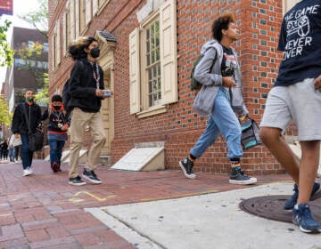 Students leave Constitution High School at the end of the school day