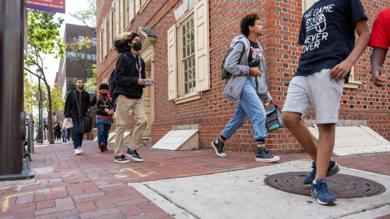 Students leave Constitution High School at the end of the school day