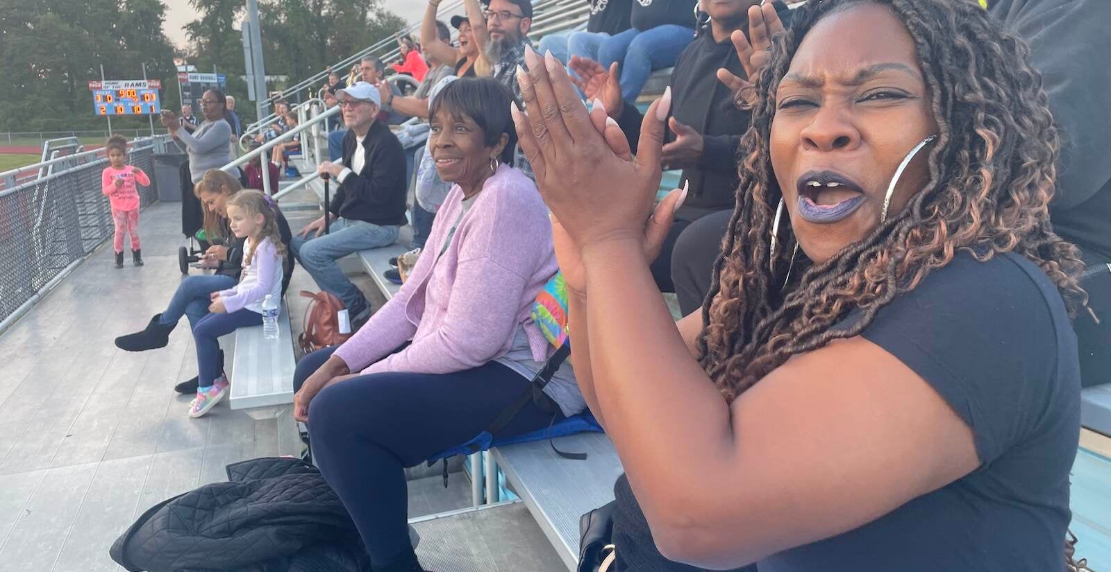 Tikisha Stewart roots for her son, who plays for Dickinson. She says safety should be paramount at games. (Cris Barrish/WHYY)