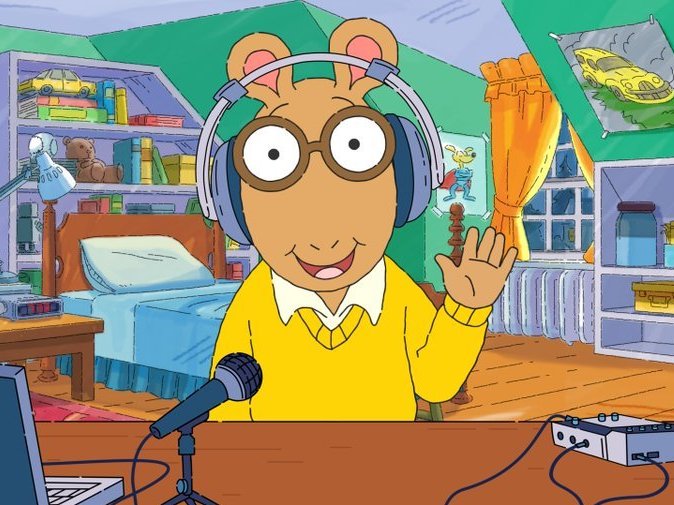 In a digital short previewing the podcast, Arthur shows his audio equipment and once again, his headphones are not on his actual ears. (PRX)