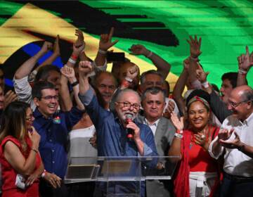 Luiz Inácio Lula da Silva speaks after winning the presidential runoff election in São Paulo on Sunday. (Nelson Almeida/AFP / Getty Images)