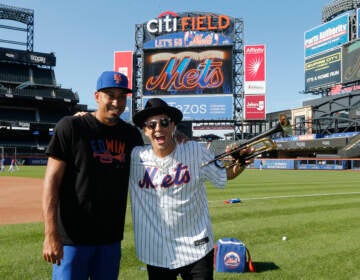 Edwin Diaz of the New York Mets and musician Timmy Trumpet pose for a photo before a game between the Mets and the Los Angeles Dodgers at Citi Field in New York City on Aug. 30. (Jim McIsaac/Getty Images)