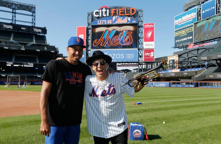 Edwin Diaz of the New York Mets and musician Timmy Trumpet pose for a photo before a game between the Mets and the Los Angeles Dodgers at Citi Field in New York City on Aug. 30. (Jim McIsaac/Getty Images)