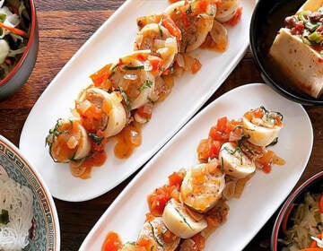 An aerial view of artfully arranged dishes of food.