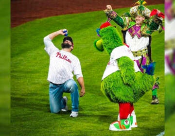 Eagles center Jason Kelce on field with the Phillie Phanatic before NLCS Game 3 at Citizens Bank Park. (@freddie9583/Twitter)