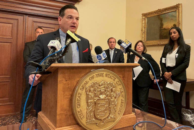 New Jersey Democratic Senate President Nicholas Scutari introduces new legislation governing the state's handgun carry law on Thursday, Oct. 13, 2022, in Trenton, N.J. Surrounded by other lawmakers and gun legislation advocates, Scutari said he thinks the proposal, which specifies that guns can't be carried in schools and other places, fits with the Supreme Court's June ruling that expanded carry rights by striking down a New York law. (AP Photo/Michael Catalini)