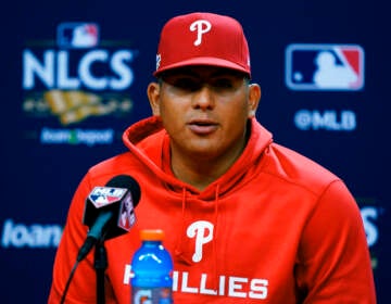 Phillies player Ranger Suarez speaks at a press conference.