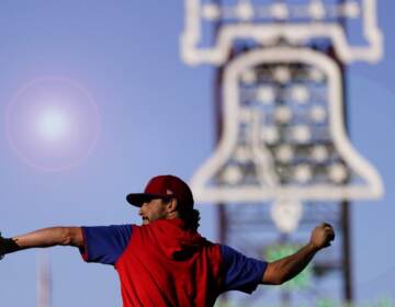 Phillies catcher Garrett Stubbs warms up during batting practice before Game 3 of NLCS at Citizens Bank Park (Matt Slocum/AP Photo)