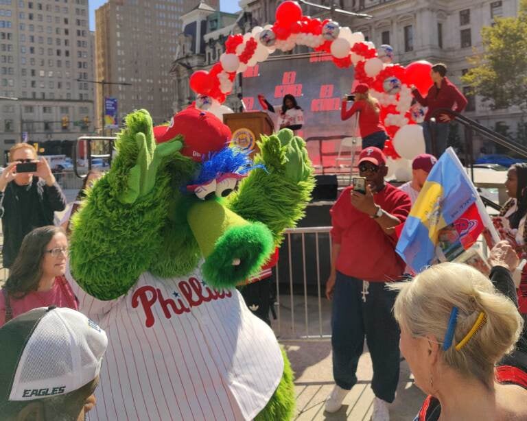 The Phillie Phanatic dances with fans at the pep rally for game 3 of the National League Championship Series. (Peter Crimmins/WHY)