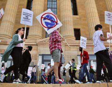 Union members picket outside the Philadelphia Museum of Art