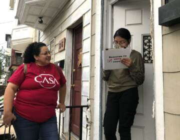 Mirna Orellana, left, a community organizer from the non-profit group We Are Casa, helps Karyme Navarro, right, fill out a voter registration form in York, Pa., on Sept. 30, 2019. (Will Weissert / AP Photo)