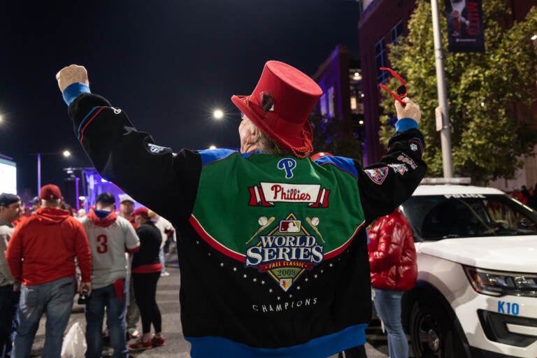 Bruce Goldman, owner of the Masquerade costume store in South Philly, wore his custom 08’ World Series jacket for game 3 of the World Series at Citizens Bank Park on Nov. 1, 2022. (Kimberly Paynter/WHYY)