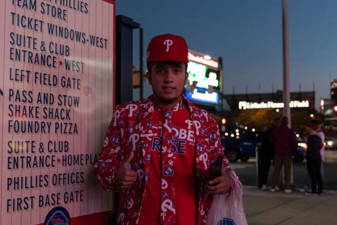 Thomas Ramos, more than a casual Phillies fan, celebrated outside game 3 of the World Series at Citizens Bank Park on November 1, 2022. (Kimberly Paynter/WHYY)