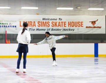 Gwendolyn Roth, 12, (left) and Keyara Cottrell, 14, are students in Laura Sims Skate House’s Wednesday Advanced Skills skating class. (Kimberly Paynter/WHYY)