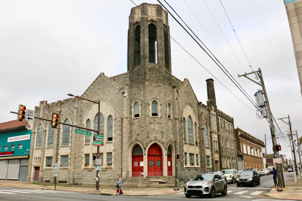 A church at a street corner.