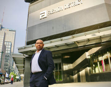 Former Philadelphia Mayor Michael A. Nutter at the entrance to the Fashion District at 10th and Market streets,. (Emma Lee/WHYY)