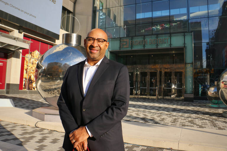 Former Philly Mayor Michael Nutter stands in front of a building.