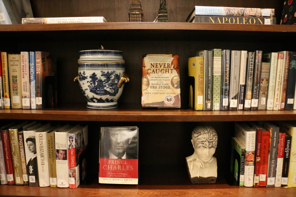 An up-close view of books on a bookshelf.