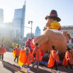 A happy turkey makes a balloon appearance at the 103rd Philadelphia Thanksgiving Day Parade. (Emily Cohen for WHYY)
