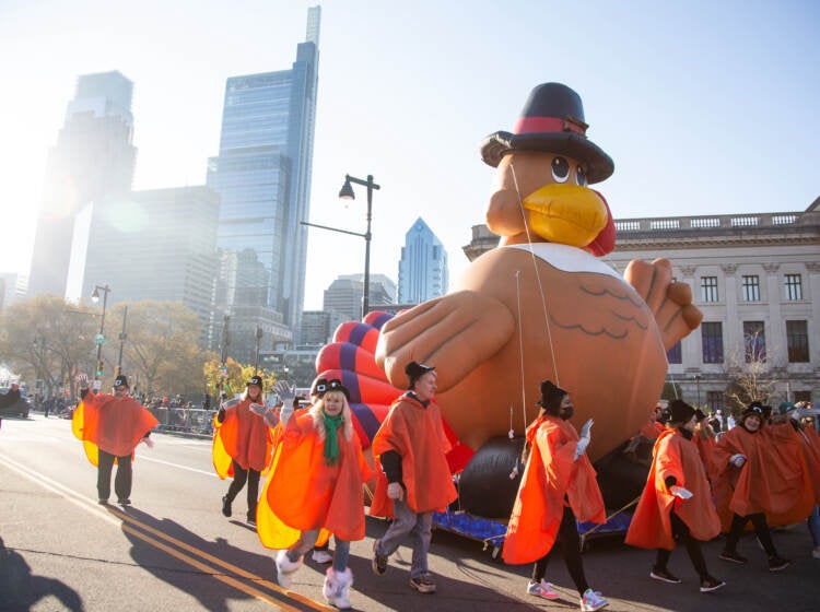 A happy turkey makes a balloon appearance at the 103rd Philadelphia Thanksgiving Day Parade. (Emily Cohen for WHYY)