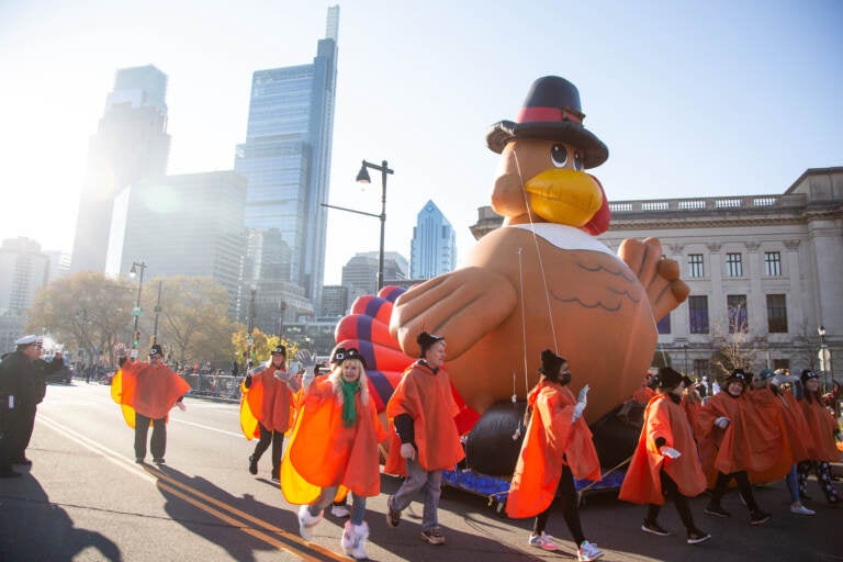 A happy turkey makes a balloon appearance at the 103rd Philadelphia Thanksgiving Day Parade. (Emily Cohen for WHYY)