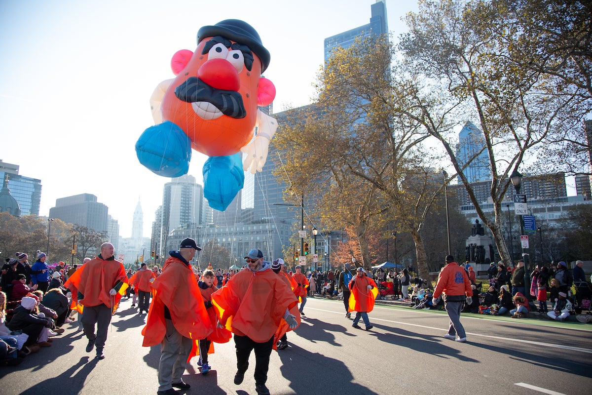 2022 24 011 – e cohen – Thanksgiving day parade-3390 Mister Potato Man makes a balloon appearance at the 103rd Philadelphia Thanksgiving Day Parade. (Emily Cohen for WHYY)