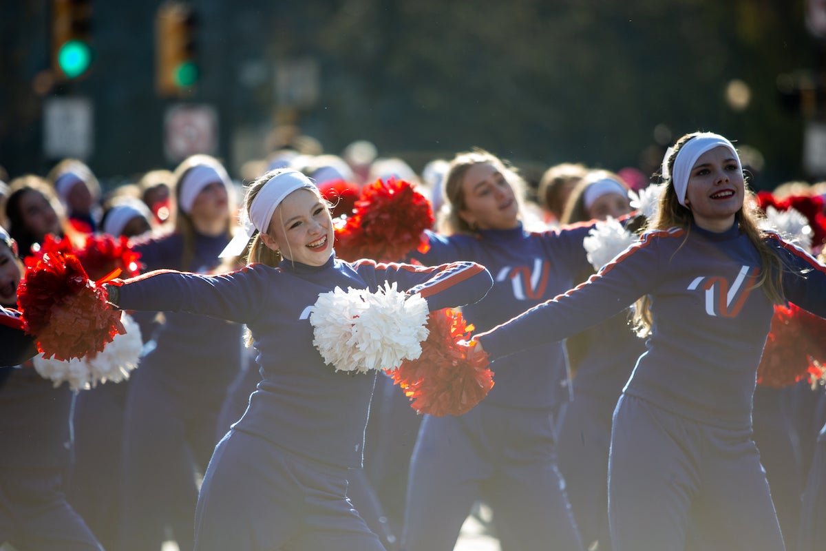 2022 24 011 – e cohen – Thanksgiving day parade-3400 Dancers with Varsity Spirit dance along the parade route at the 103rd Philadelphia Thanksgiving Day Parade. (Emily Cohen for WHYY)