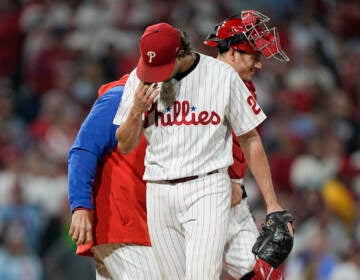 Philadelphia Phillies starting pitcher Aaron Nola leaves the game with bases loaded during the fifth inning in Game 4 of baseball's World Series between the Houston Astros and the Philadelphia Phillies on Wednesday, Nov. 2, 2022, in Philadelphia. (AP Photo/David J. Phillip)