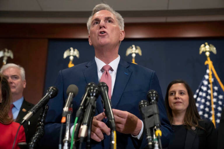 House Minority Leader Kevin McCarthy, of Calif., talks the media, Tuesday, Nov. 15, 2022, after voting on top House Republican leadership positions, on Capitol Hill in Washington. Rep. Elise Stefanik, R-N.Y., is at right. (AP Photo/Jacquelyn Martin)
