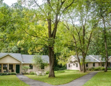 Houses visible with trees visible around the buildings