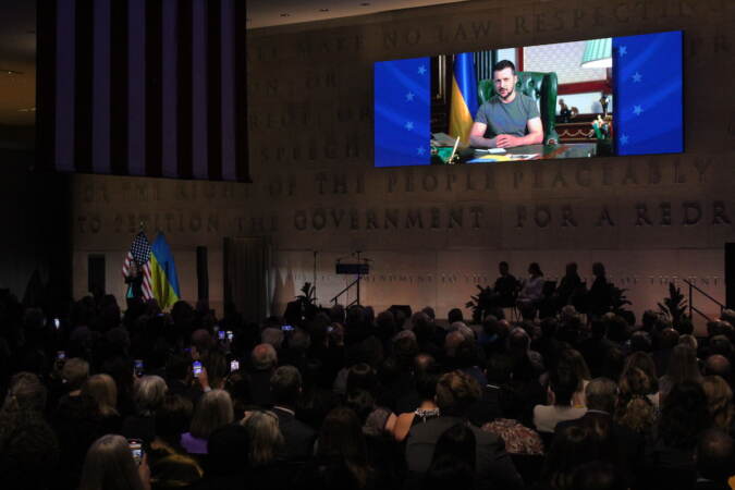 Ukraine President Volodymyr Zelenskyy delivered a prerecorded message from Kiev to those in attendance at the 2022 Liberty Medal ceremony at the National Constitution Center on Nov. 7, 2022. (Cory Sharber/WHYY)