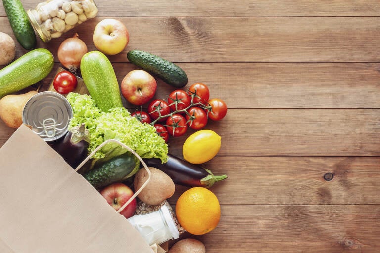 A bag of groceries is seen from above.