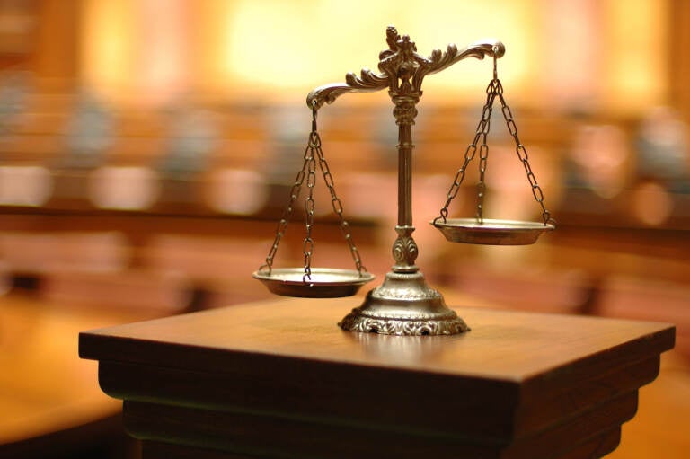 A scale is seen as a symbol of law and justice