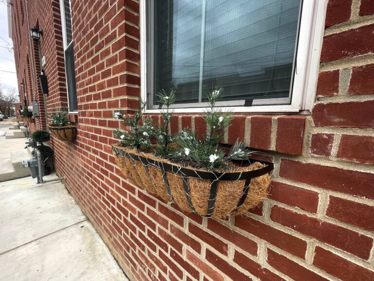 Flower pots adorn the front of some new homes on Bennett Street.