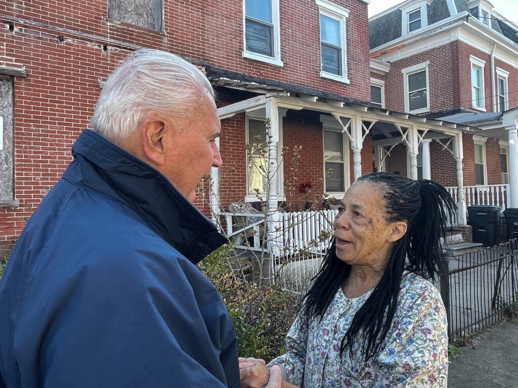 Cora Mills speaks with Wilmington Mayor Mike Purzycki.