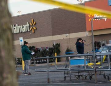 Members of the FBI investigate Tuesdays fatal shooting at the Chesapeake Walmart Supercenter on Wednesday in Chesapeake, Virginia. Six people, including the suspected gunman, are dead following. (Nathan Howard/Getty Images)