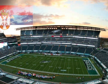 Aerial view of Lincoln Financial Field with the Serbian coat of arms floating above it.