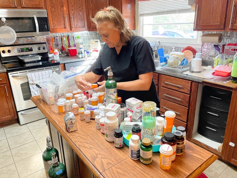 Cinde Lucas, whose husband Rick has suffered from long COVID, examines the many supplements and prescription medications he tried while looking for something to combat brain fog, depression and fatigue. (Blake Farmer/ WPLN)