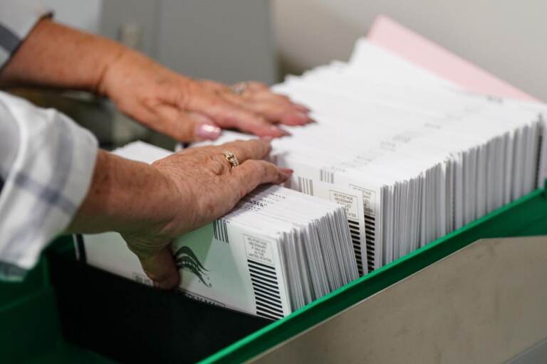 A close-up of mail ballots.