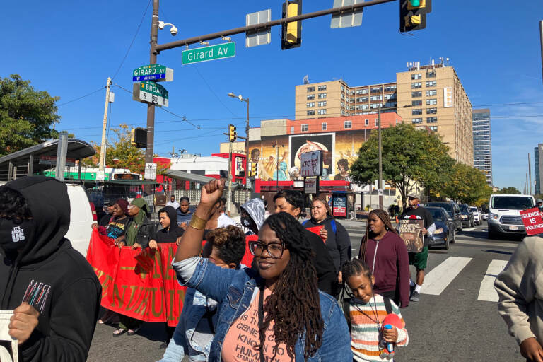 Rahnda Rize, Philadelphia activist and performing artist, participates in the Million Kid March from North Philadelphia to City Hall on Oct. 15.(Sammy Caiola/WHYY)