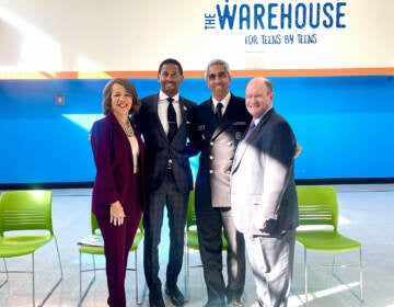 State officials alongside U.S. Surgeon General Vivek Murthy at The Warehouse in Wilmington, Delaware. (Johnny Perez-Gonzalez/WHYY)