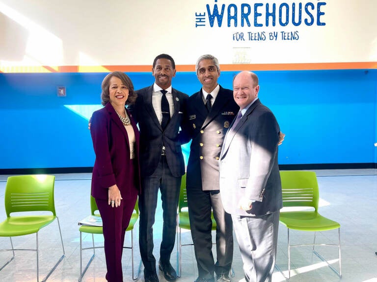 State officials alongside U.S. Surgeon General Vivek Murthy at The Warehouse in Wilmington, Delaware. (Johnny Perez-Gonzalez/WHYY)