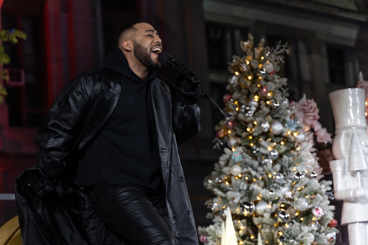 Performer Julian King sings a Christmas Classic at the City of Philadelphia’s annual Christmas Tree Lighting Ceremony at City Hall on Dec. 1, 2022. (Kimberly Paynter/WHYY)