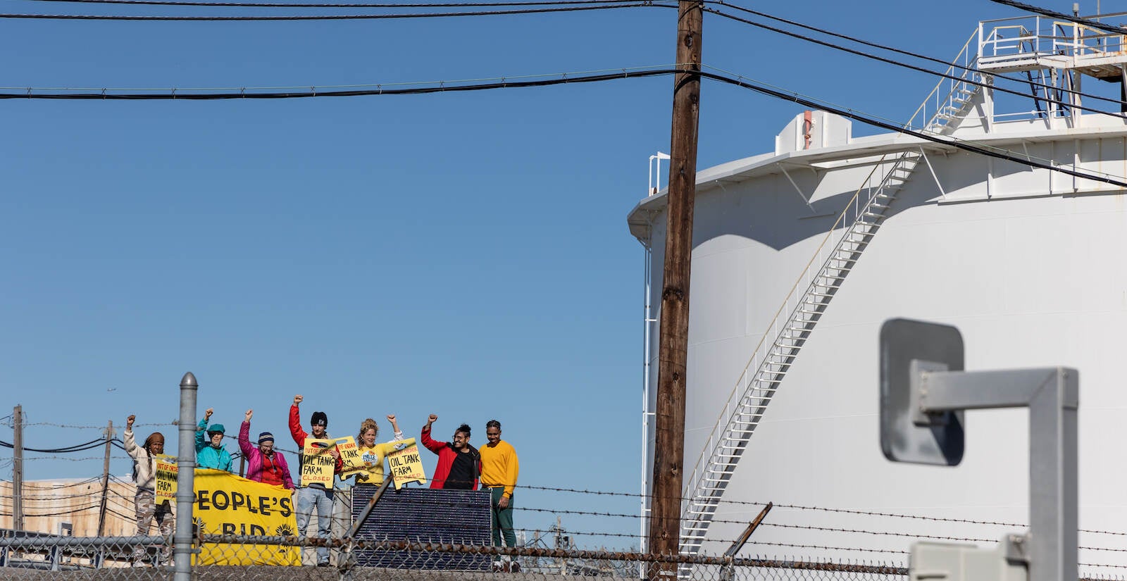 Protesters demonstrate in a restricted area of the South Philadelphia oil tank farm