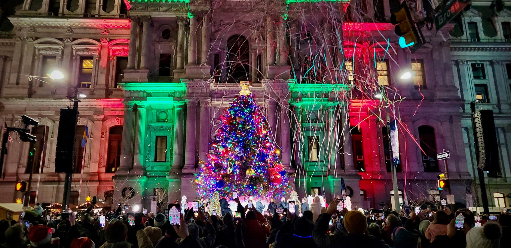 A Christmas tree is lit outside Philadelphia City Hall