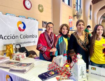 Executive Director of Accion Colombia, Leity Rodriguez-Largo (second from right), alongside her colleagues and volunteers of Sal y Dulce. (Johnny Perez-Gonzalez/WHYY)